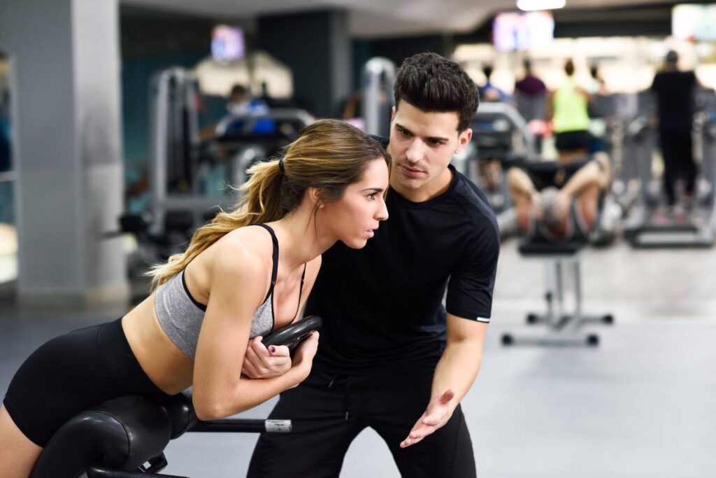 personal trainer e sua aluna